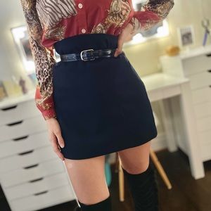 Navy blue, above knee, accent zipper, classy skirt.